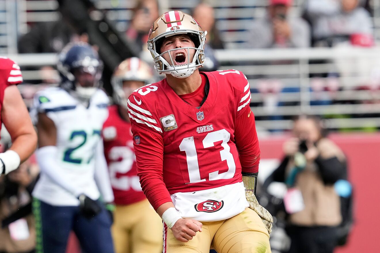 San Francisco 49ers quarterback Brock Purdy (13) celebrates after...