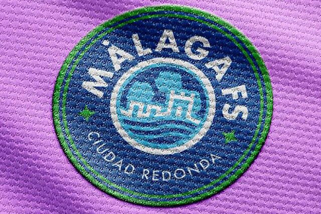 Escudo del M�laga F�tbol Sala en una de sus camisetas