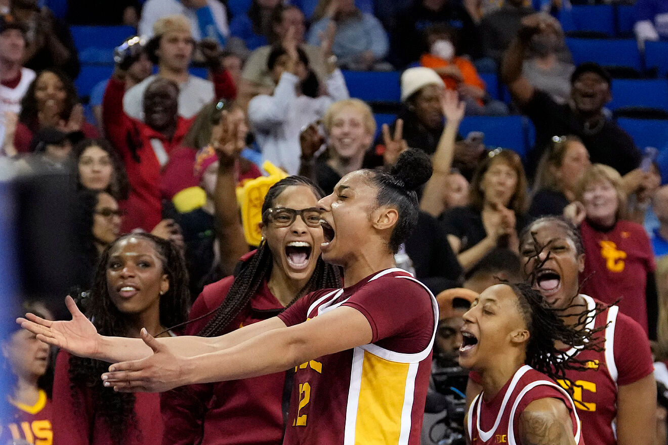 Southern California guard JuJu Watkins, center, celebrates with...