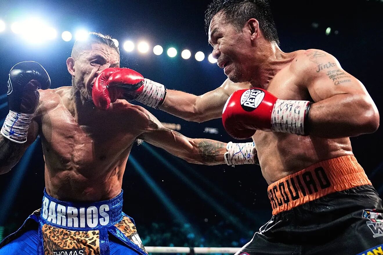 Manny Pacquiao hits Mario Barrios with his right hand