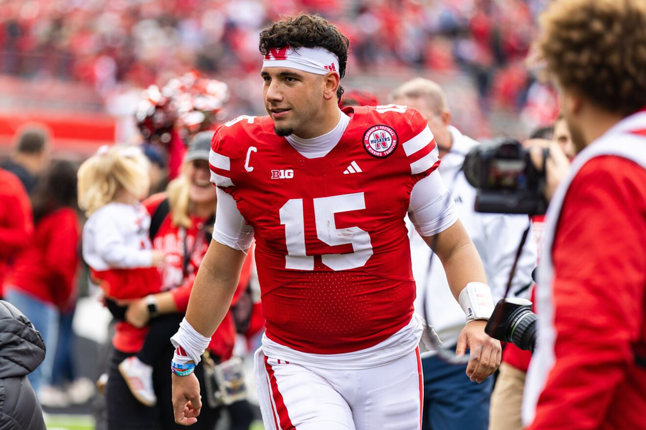Nebraska quarterback Dylan Raiola (15) walks off the field after a win...