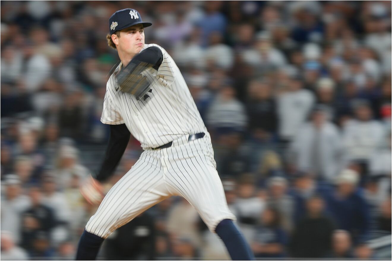 New York Yankees pitcher Cam Schlittler delivers against the Boston...