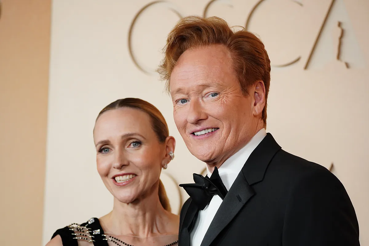 Who is Conan O'Brien's wife and how many children do they have?