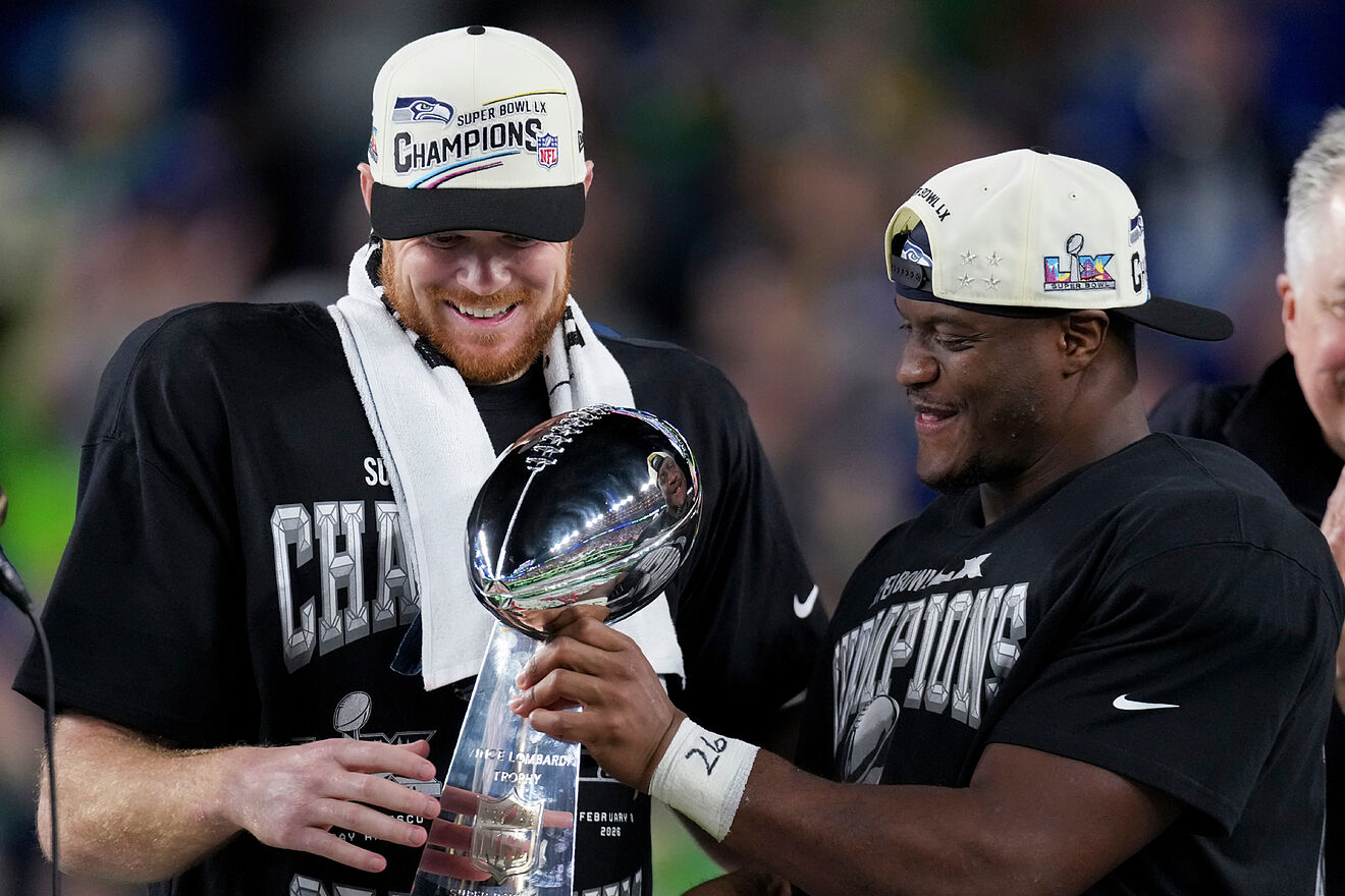 Seattle Seahawks quarterback Sam Darnold, and running back Kenneth...