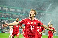Harry Kane celebra uno de sus goles contra el Stuttgart