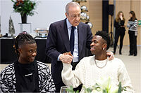Florentino, con Vinicius y Camavinga durante la comida de Navidad.