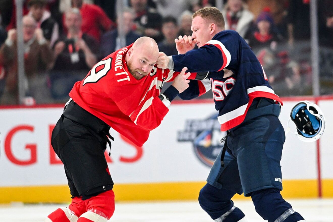 Canada's Sam Bennett, left, fights with United States' Brady Tkachuk...