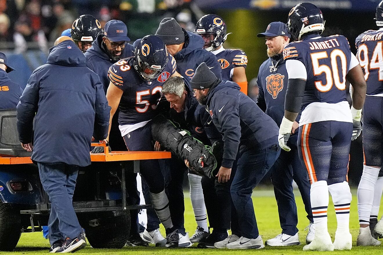 TJ Edwards leaves the field injured.