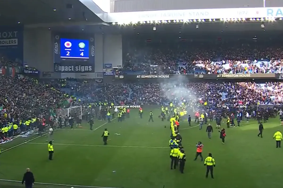 Old Firm chaos: Ugly scenes in Rangers vs Celtic game as fans invade pitch and police forced to intervene
