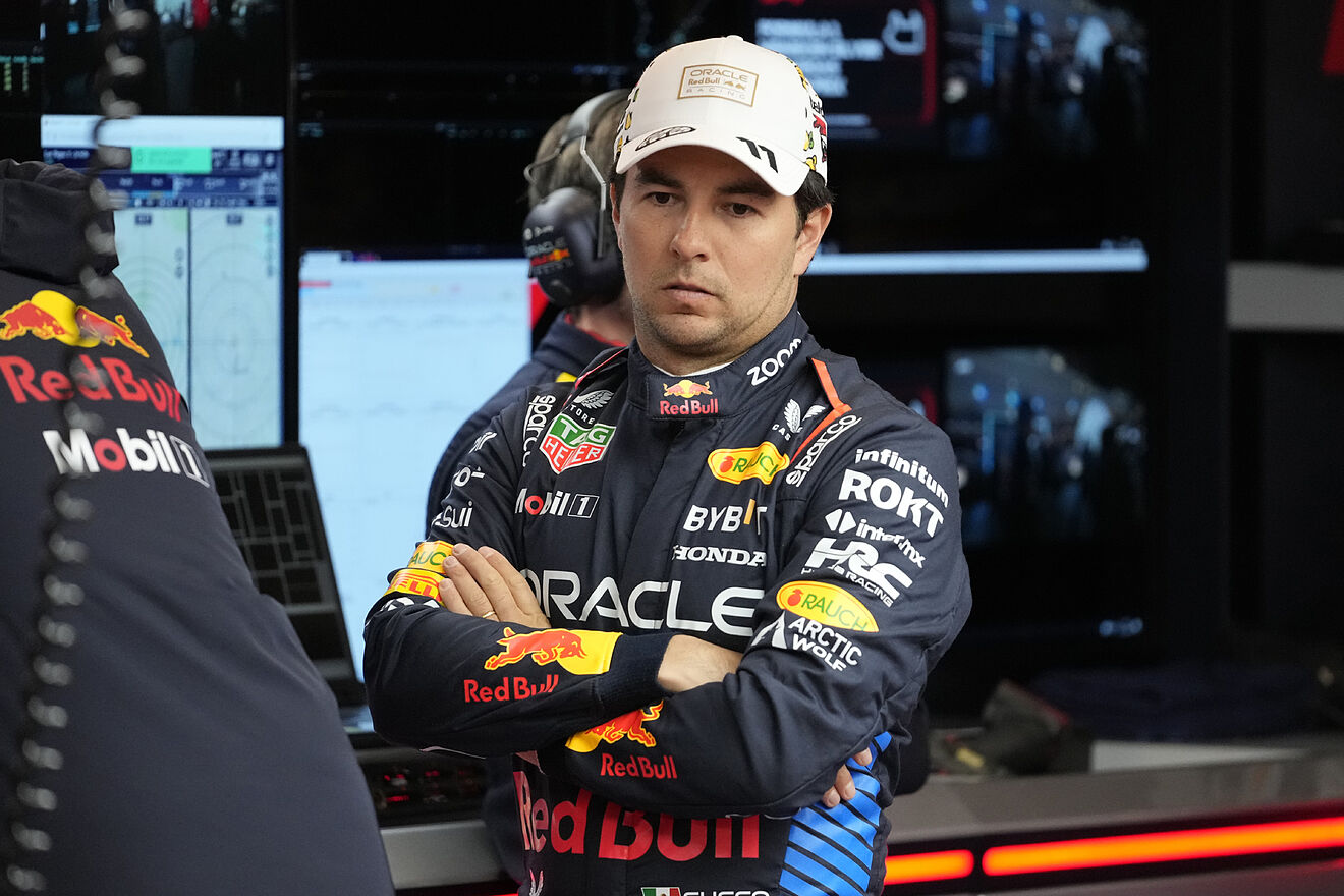 Red Bull driver Sergio Perez, of Mexico, waits in the garage area