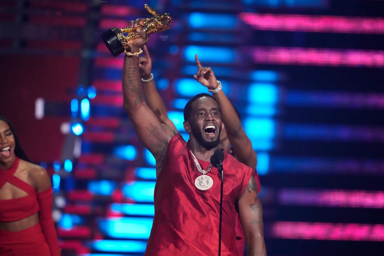 Sean "Diddy" Combs accepts the global icon award during the MTV Video...