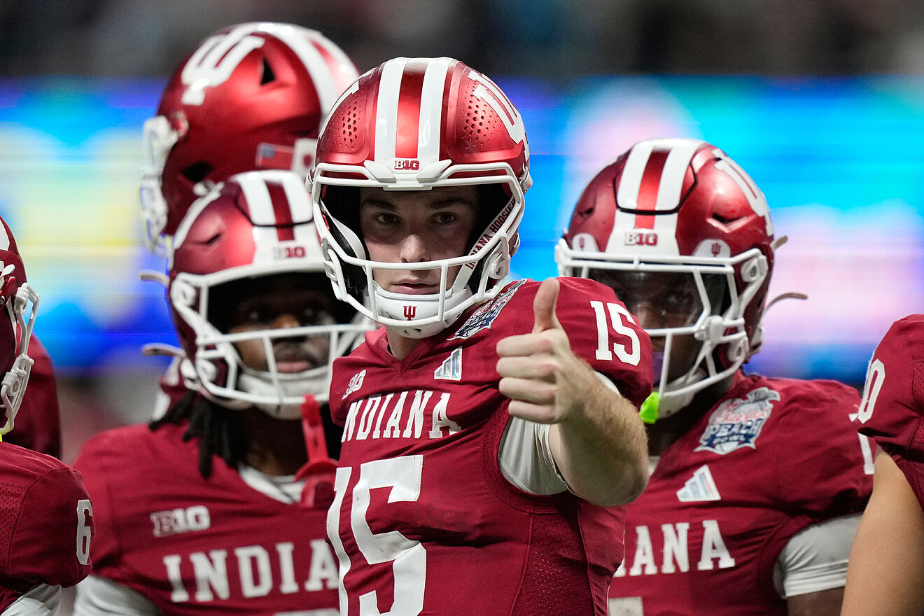 Indiana quarterback Fernando Mendoza (15) reacts during the Peach Bowl...