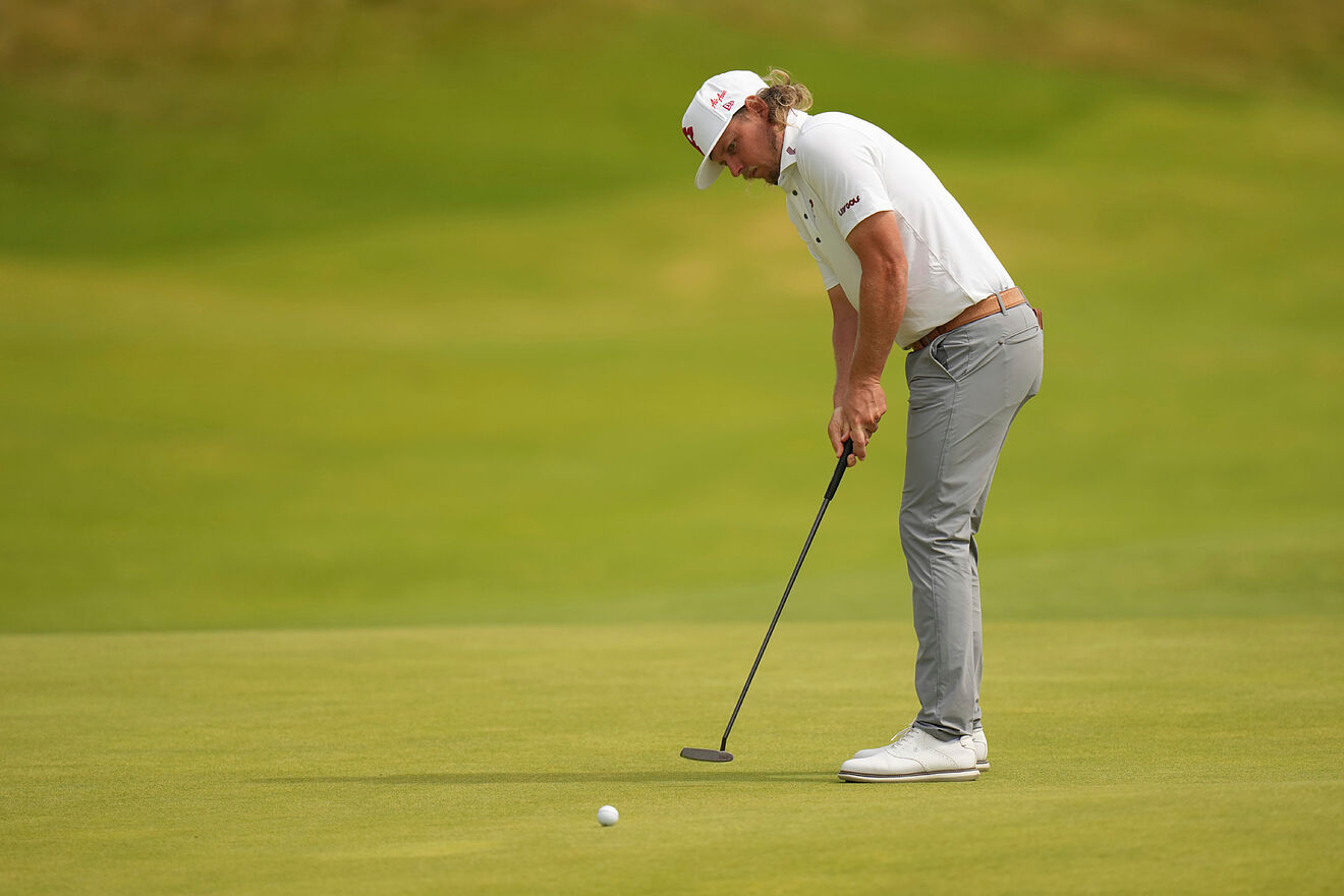 Cameron Smith, of South Africa, putts on the seventh green during the...