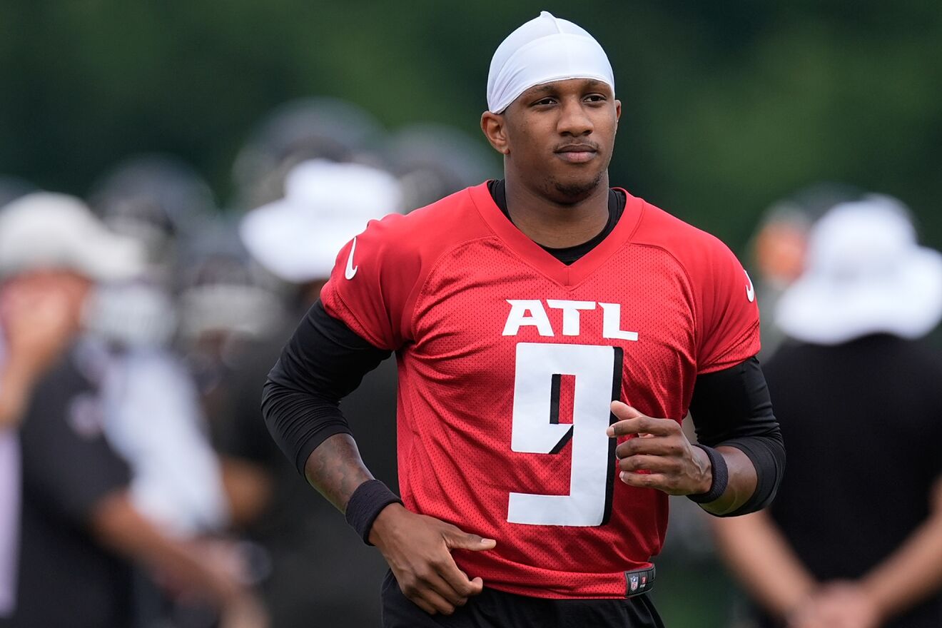 Atylanta Falcons rookie quarterback Michael Penix Jr., runs to a drill...