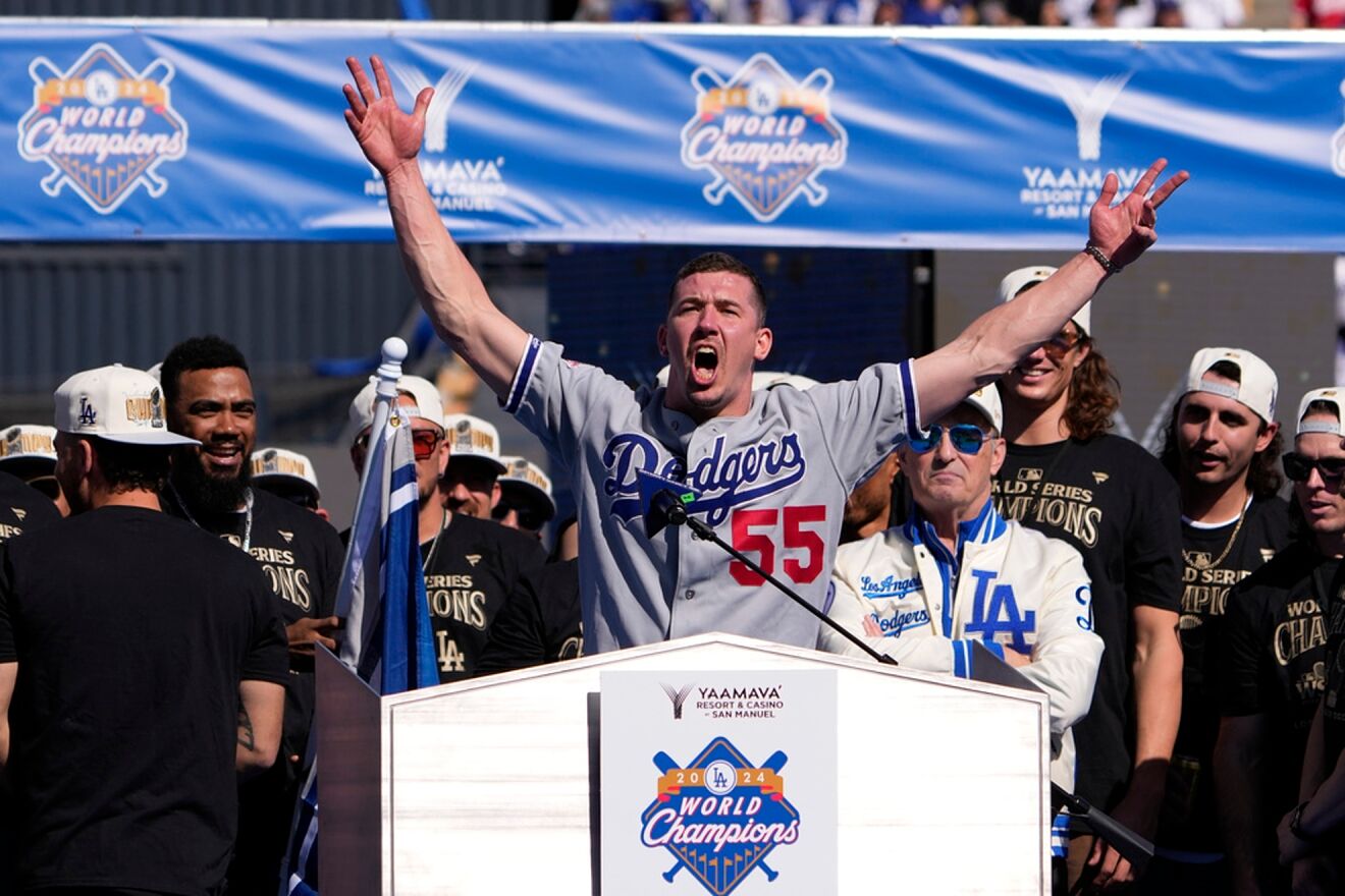 Los Angeles Dodgers' Walker Buehler celebrates on the stage during the...