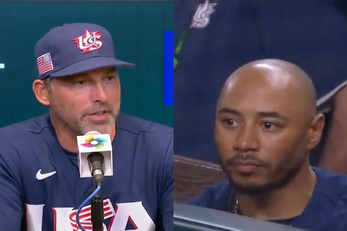 Mark DeRosa (left) speaks to the media after USA's loss against Japan....