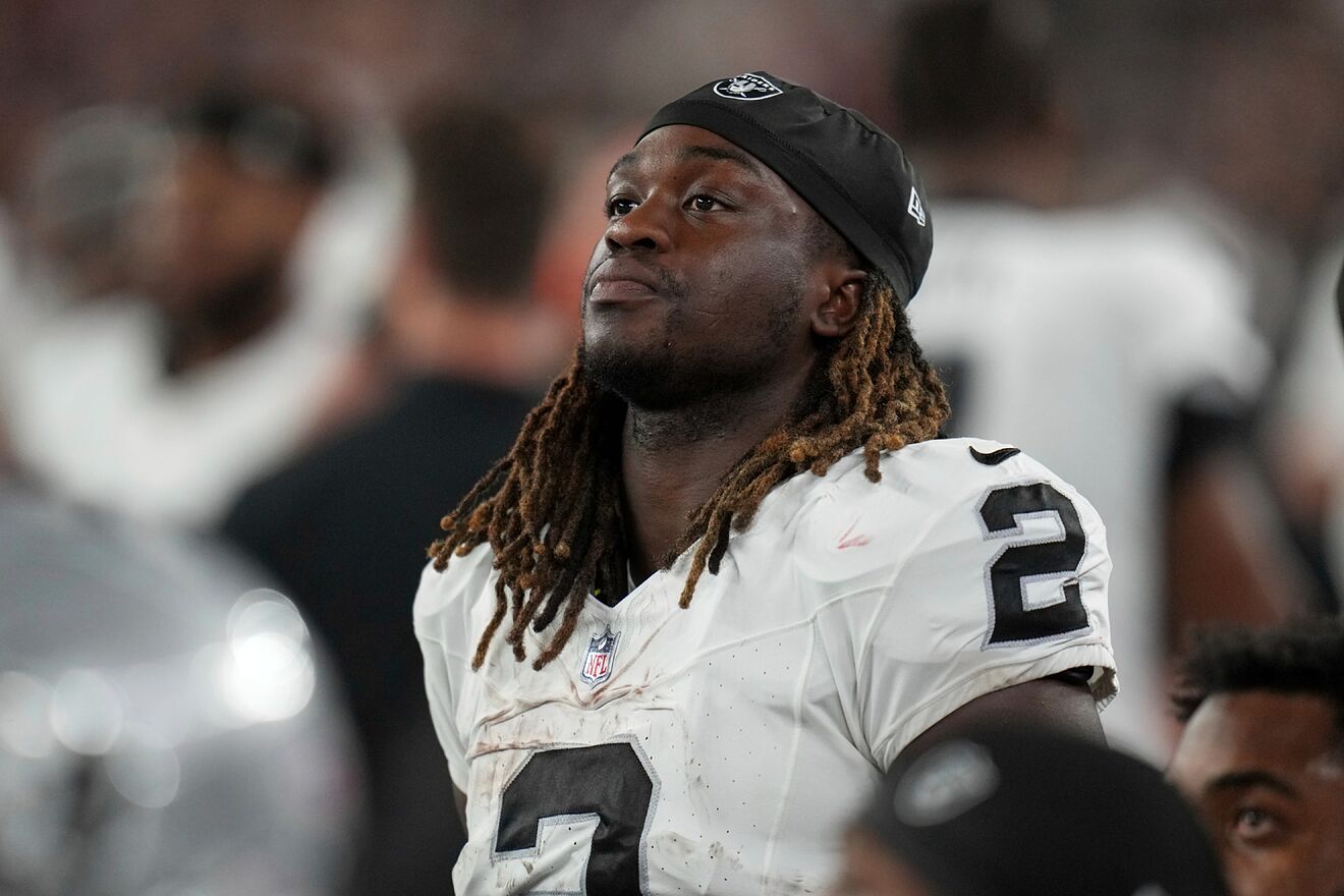 Ashton Jeanty seems disappointed with his three-touchdown game.