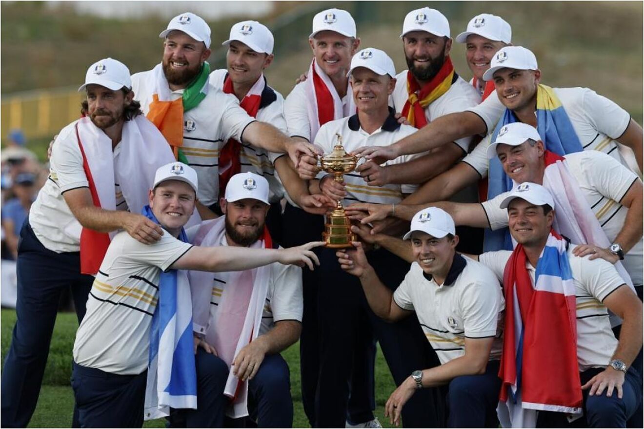 The entire European team poses with the Ryder Cup trophy.