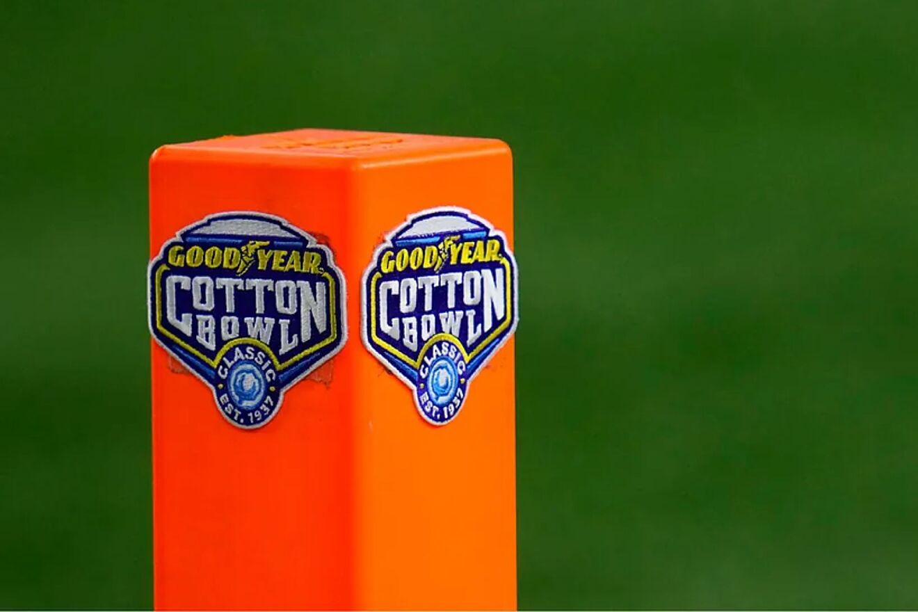 Logos are shown on a pylon before the Cotton Bowl NCAA college...