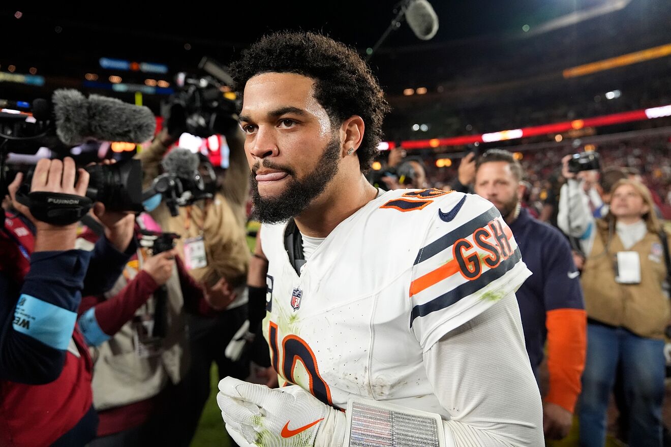 Chicago Bears quarterback Caleb Williams leaves the field after an...