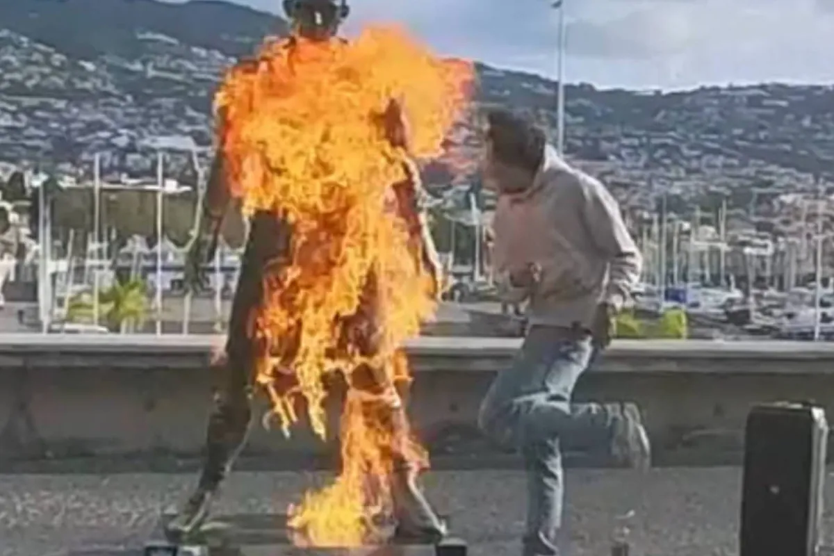 A man sets fire to Cristiano Ronaldo statue, almost burns himself and makes chilling threat