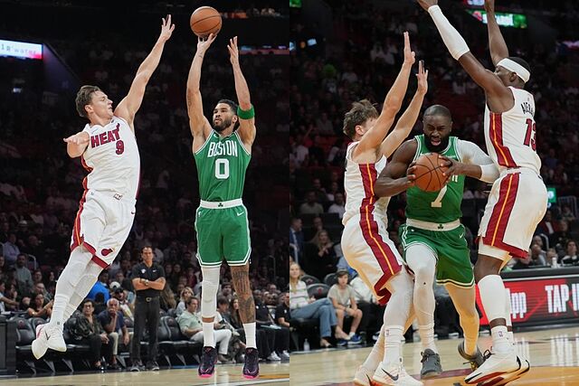 Jayson Tatum (dcha.) y Jaylen Brown (izqda.) tratan de anotar durante el partido.