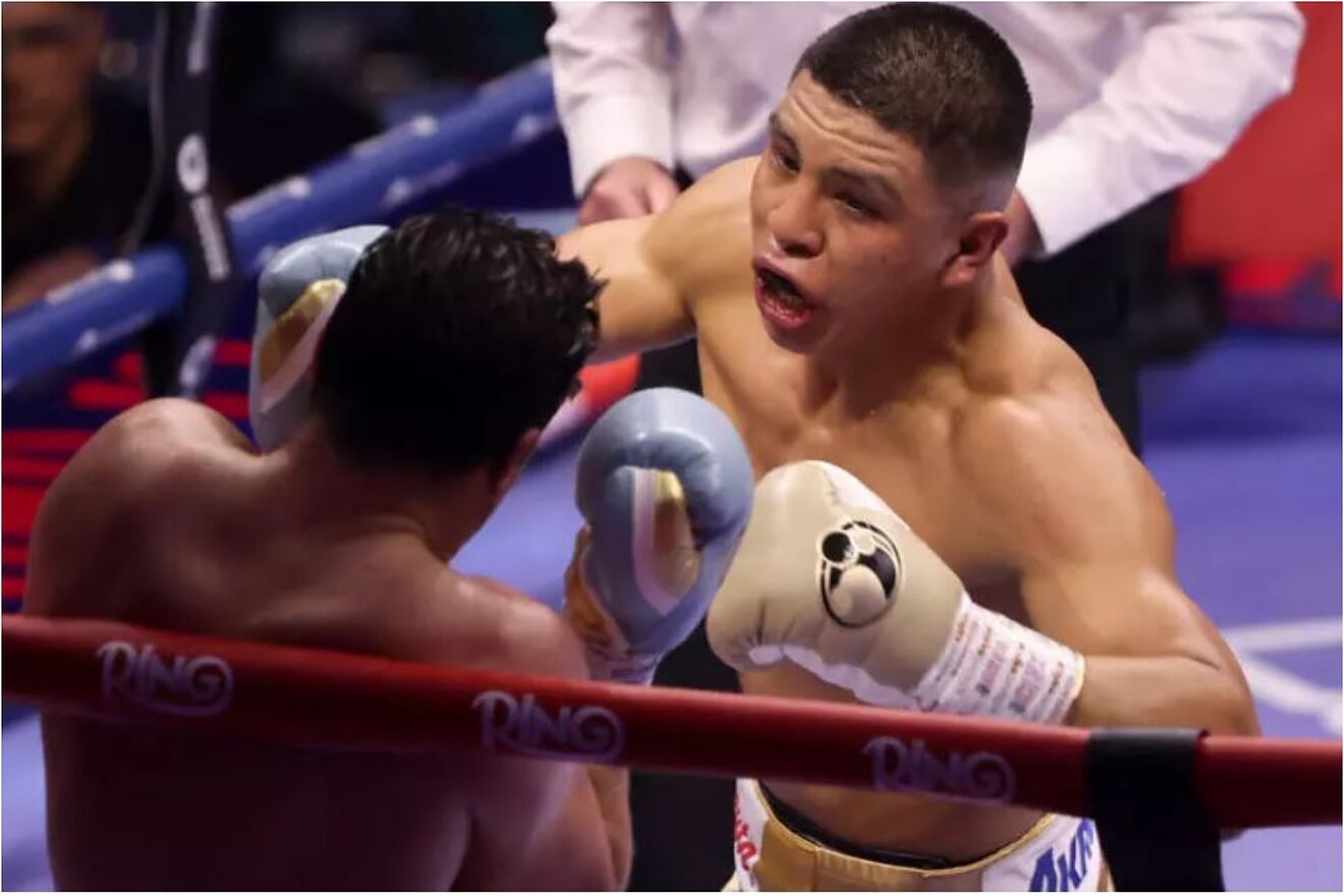 France's Bruno Surace (left) and Mexico's Jaime Munguia fight in the...