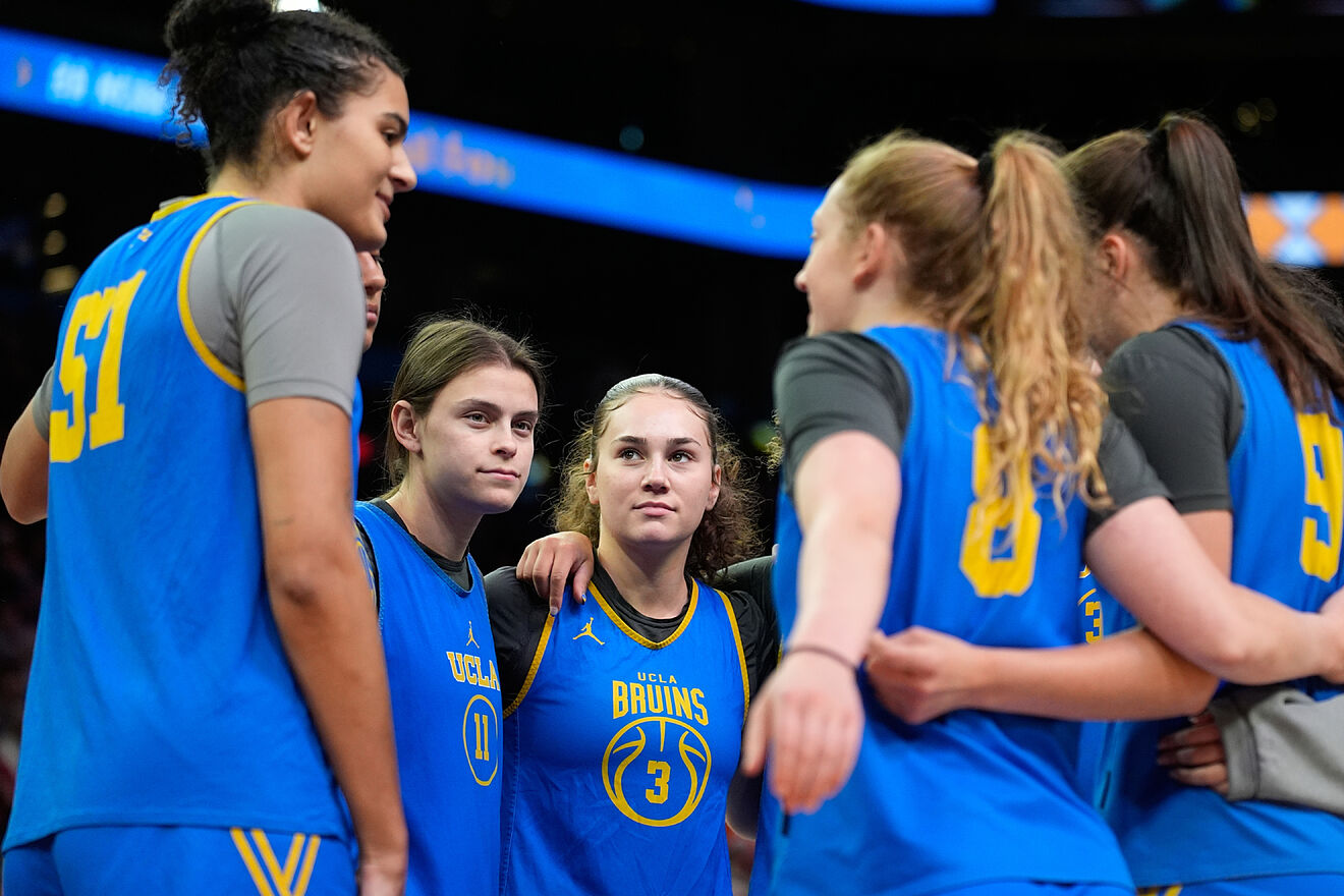 UCLA teammates during a practice at the NCAA college basketball...