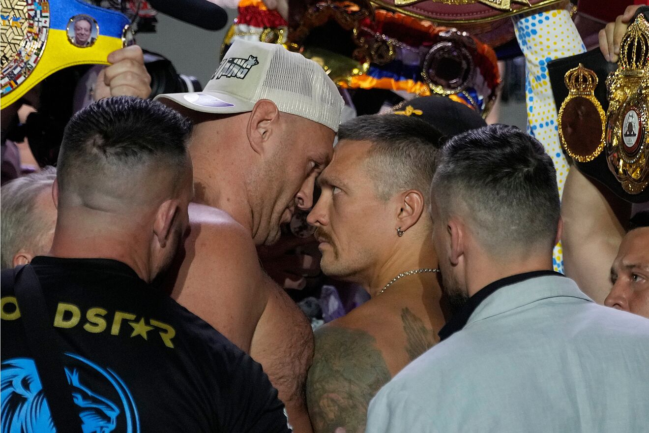 Tyson Fury and Oleksandr Usyk at the weigh-in.