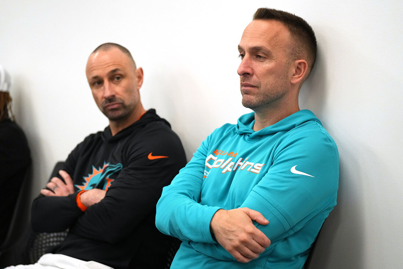 Miami Dolphins general manager Jon-Eric Sullivan (left) and head coach...