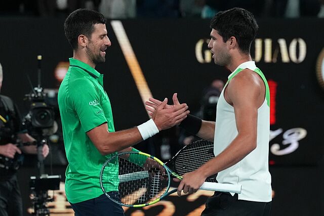 Djokovic y Alcaraz, en la red.