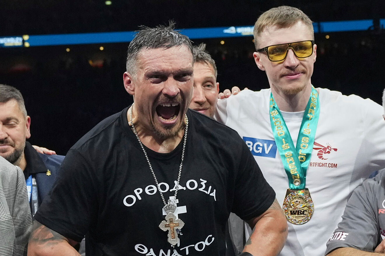 Oleksandr Usyk alongside manager Sergey Lapin after defeating Daniel...