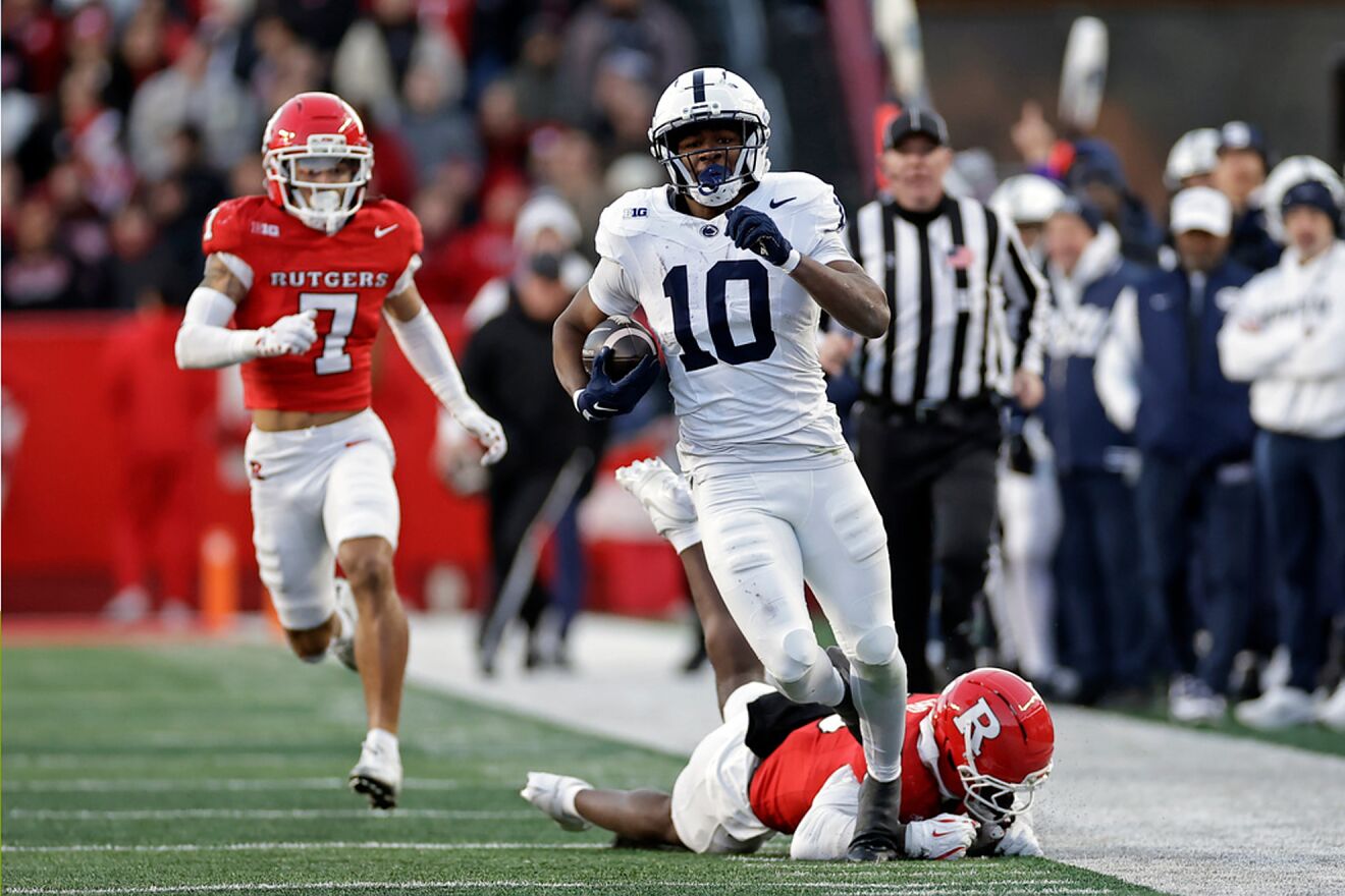 Penn State running back Nicholas Singleton (10) runs with the ball
