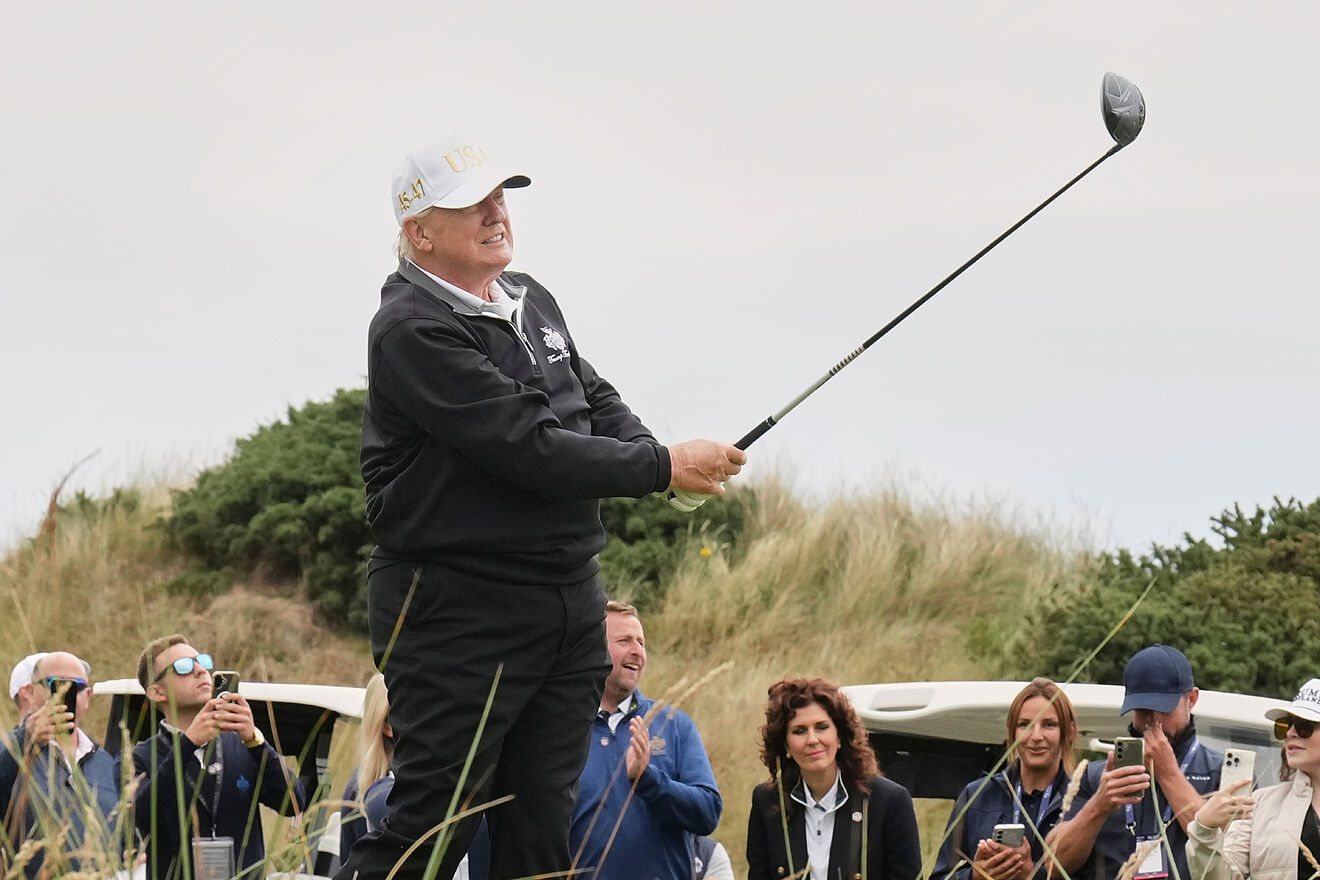 Donald Trump tees off during the opening ceremony for the Trump...
