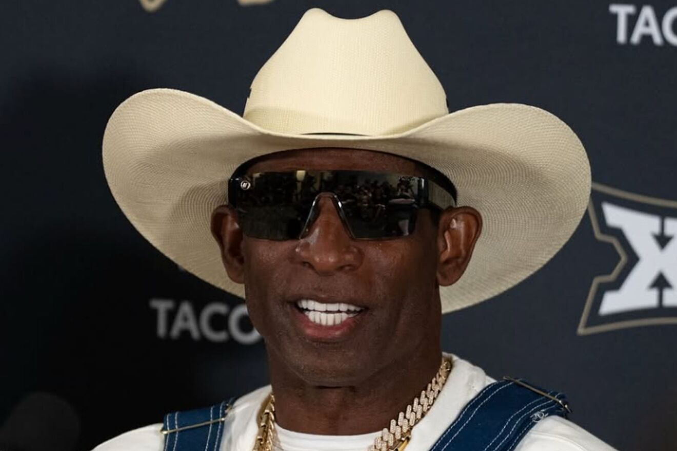 Deion Sanders vibes hard to a Deion Sanders Jr. song while driving his...