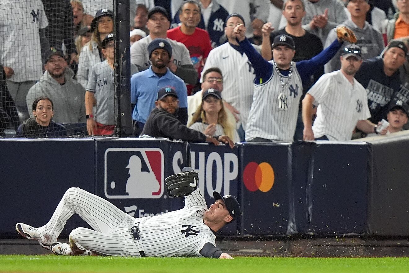 New York Yankees left fielder Cody Bellinger (35) makes a sliding...