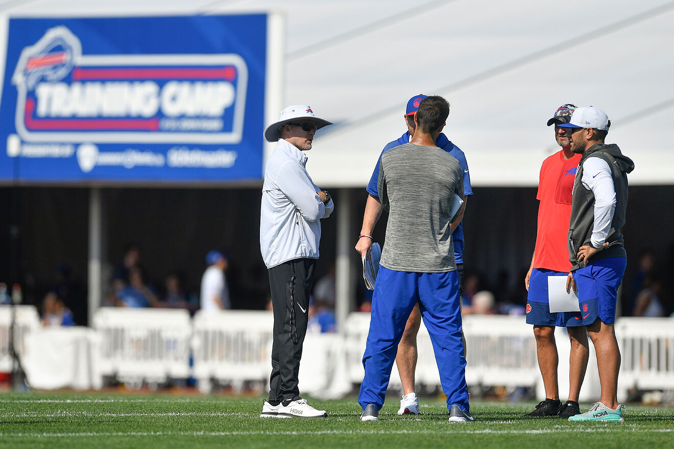 Buffalo head coach Sean McDermott, left, meets with coaches during...