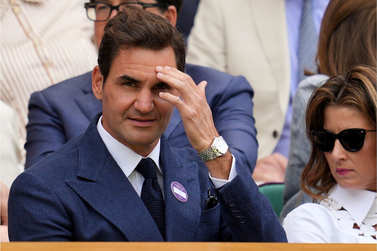 Tennis legend Roger Federer and his wife Mirka sit in the Royal Box on...