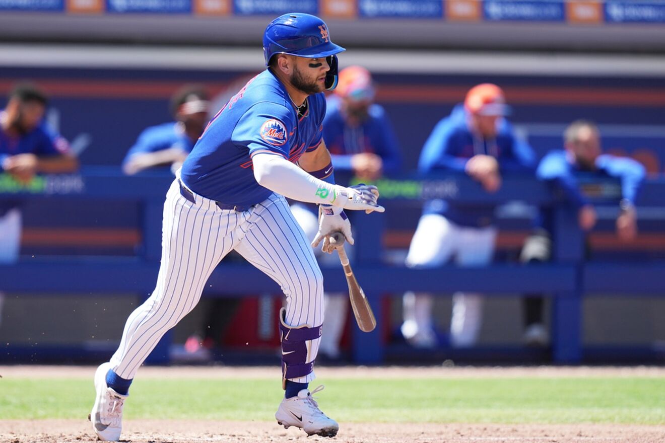 New York Mets' Bo Bichette runs after hitting a single.