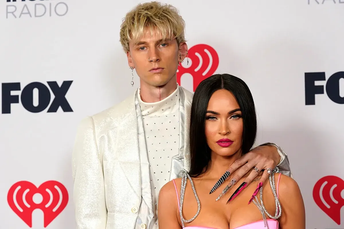 Machine Gun Kelly reacts after Megan Fox is mistaken for his 16-year-old daughter at Paris event