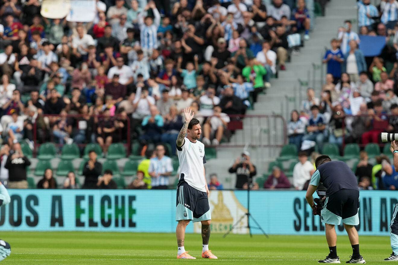 Argentina's Lionel Messi waves during a training session with the...