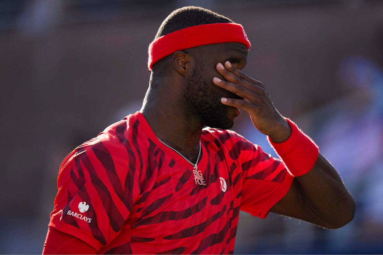 Frances Tiafoe, of the United States, reacts after a rally against...