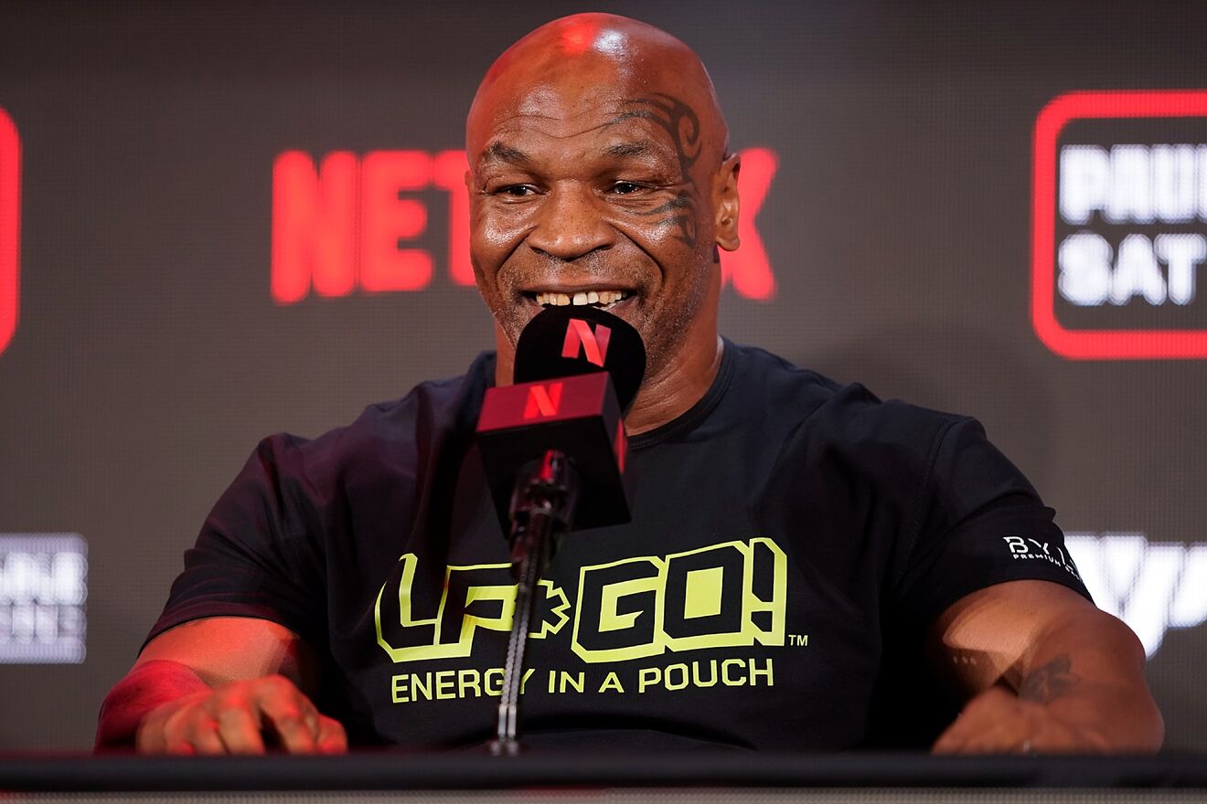 Mike Tyson speaks during a news conference about his upcoming boxing...