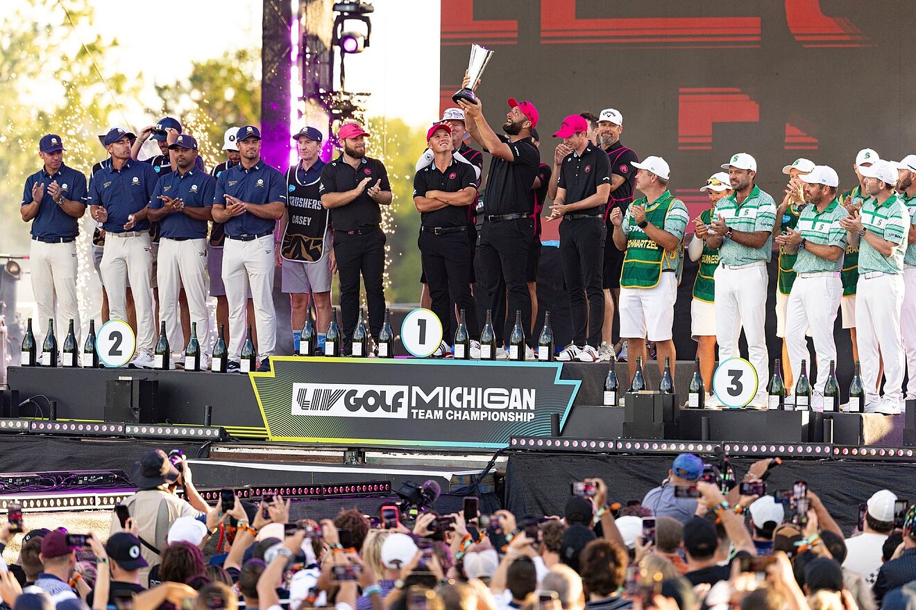 Team Champion Captain Jon Rahm of Legion XIII lifts the trophy...
