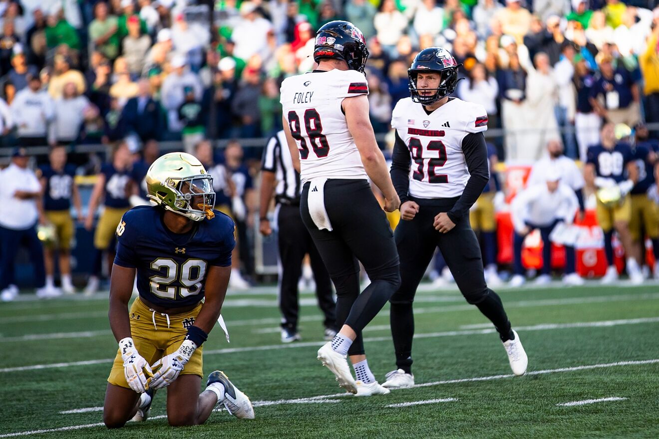 Northern Illinois kicker Kanon Woodill (92) celebrates with punter Tom...