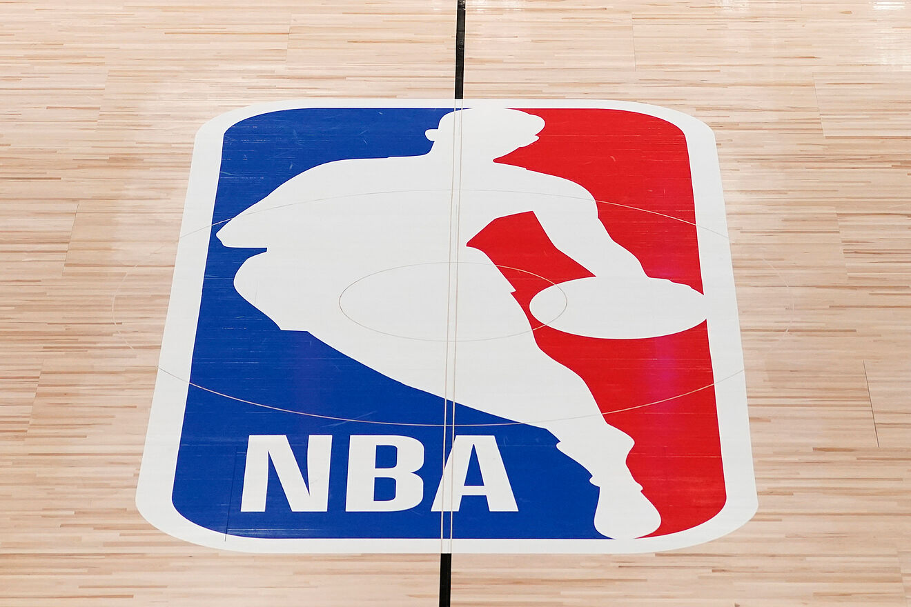 NBA logo shown on a basketball court