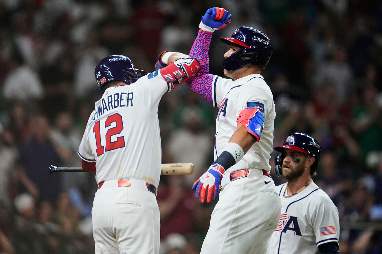United States' Aaron Judge, center, celebrates with Kyle Schwarber,...