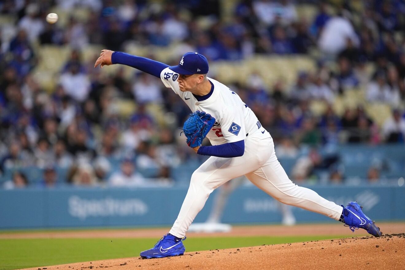 Los Angeles Dodgers starting pitcher Bobby Miller throws to the plate.