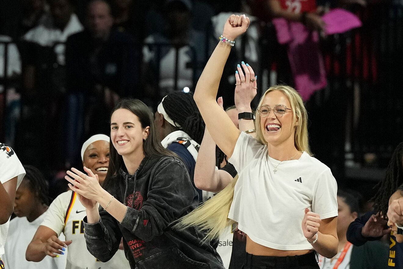 Indiana Fever guards Caitlin Clark, front left, and Sophie Cunningham