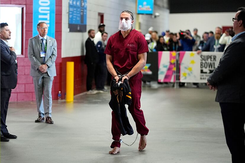 Patriots’ Mack Hollins Arrives to Super Bowl 2026 in Prison Uniform Barefoot And Shackled [VIDEO]